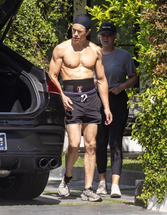 Los Angeles, CA  - *EXCLUSIVE*  - A shirtless Tom Sandoval and Billie Lee are seen together at his home on a Thursday morning as Billie helps Tom carry a large package to his car. A shirtless Tom Sandoval and Billie Lee are seen together at his home on a Thursday morning as Billie helps Tom carry a large package to his car. Tom made sure to wear a lifting belt to protect his back. Billie Lee has been spotted spending a lot of time with Tom lately after his affair with co-star Raquel Leviss. Billie haS come under fire for the friendship and has defended her friendship with both Tom and Ariana saying “Tom and Ariana are my family, they have been there for me over the years and I wouldn’t be where I’m am today without them'' going on to add "It saddens me that people are so fixated on picking a side. Both are human and are both hurting in their own ways.”Pictured: Tom Sandoval, Billie LeeBACKGRID USA 27 APRIL 2023 USA: +1 310 798 9111 / usasales@backgrid.comUK: +44 208 344 2007 / uksales@backgrid.com*UK Clients - Pictures Containing ChildrenPlease Pixelate Face Prior To Publication*