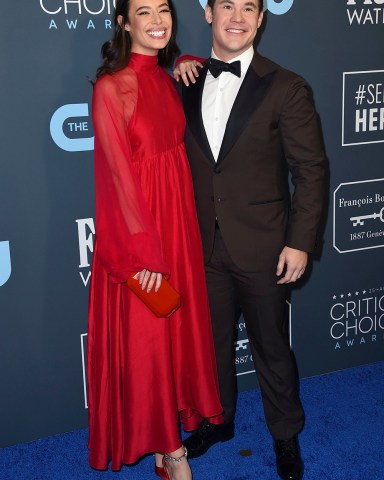 Chloe Bridges, Adam Devine. Chloe Bridges, left, and Adam Devine arrive at the 25th annual Critics' Choice Awards, at the Barker Hangar in Santa Monica, Calif
25th Annual Critics' Choice Awards - Arrivals, Santa Monica, USA - 12 Jan 2020