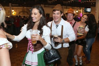 Adam Devine, Chloe Bridges. Chloe Bridges, from left, actor Adam Devine and guests dressed in German traditional outfits have fun at the "Oktoberfest HB" at the Old World German Restaurant, in Hiuntington Beach, Calif
Adam Devine at the "Oktoberfest ", Huntington Beach, USA - 18 Oct 2019