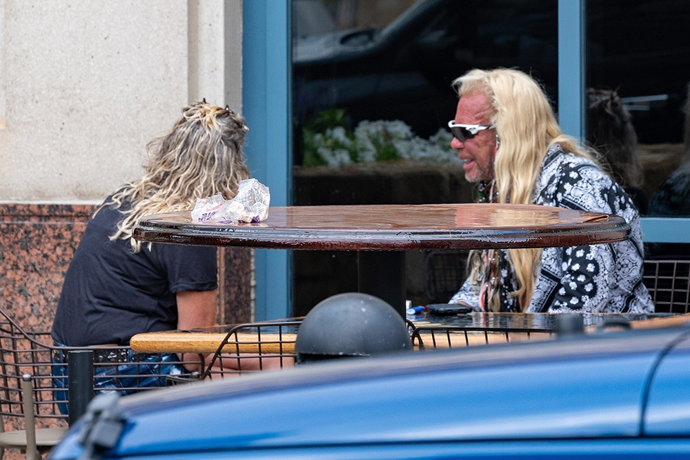 *EXCLUSIVE* Duane 'Dog The Bounty Hunter' Chapman and new wife Francie enjoy a smoke break post wedding