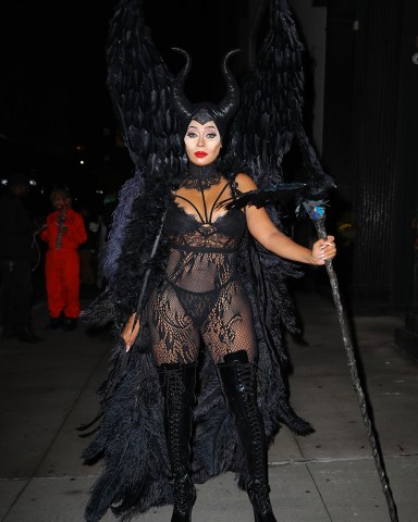 La La Anthony transforms into an eye-popping Maleficent as she pairs racy lingerie with evil queen's horns and wings for Halloween in NYC  Pictured: La La Anthony Ref: SPL5125828 311019 NON-EXCLUSIVE Picture by: Felipe Ramales / SplashNews.com  Splash News and Pictures USA: +1 310-525-5808 London: +44 (0)20 8126 1009 Berlin: +49 175 3764 166 photodesk@splashnews.com  World Rights
