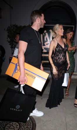 West Hollywood, CA - A pregnant Heather Rae Young celebrates her 35th birthday with her husband Tarek El Moussa at Craig's in West Hollywood.  The 'Selling Sunset' star elegantly dressed her growing baby bump in a black lace dress.  As he left, Tarek wasn't shy about showing some affection as he passionately kissed Heather.  Pictured: Heather Rae Young, Tarek El Mousa BACKGRID USA SEPTEMBER 15, 2022 BYLINE SHOULD READ: HEDO / BACKGRID USA: +1 310 798 9111 / usasales@backgrid.com UK: +44 208 344 2007 / uksales@backgrid .com *UK Customers - Images Containing Children Pixelate Face Before Posting*