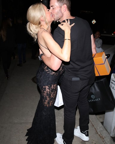 West Hollywood, CA  - A pregnant Heather Rae Young celebrates her 35th birthday with Hubby Tarek El Moussa at Craig's in West Hollywood. The 'Selling Sunset ' star elegantly dressed up her growing baby bump in a black lace dress. While leaving Tarek wasn't shy to show some affection as he passionately kisses Heather.Pictured: Heather Rae Young, Tarek El MousaBACKGRID USA 15 SEPTEMBER 2022 BYLINE MUST READ: HEDO / BACKGRIDUSA: +1 310 798 9111 / usasales@backgrid.comUK: +44 208 344 2007 / uksales@backgrid.com*UK Clients - Pictures Containing ChildrenPlease Pixelate Face Prior To Publication*