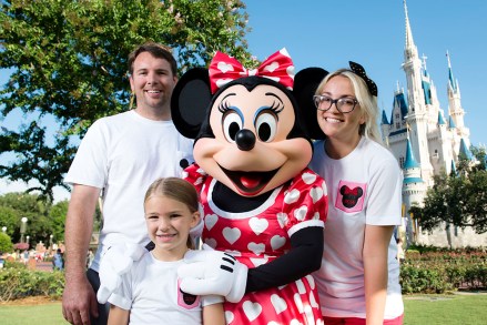 Actress and country music artist Jamie Lynn Spears poses Aug.  14, 2014 with her six-year-old daughter Maddie, her husband Jamie Watson and Minnie Mouse in front of Cinderella Castle at the Magic Kingdom park in Lake Buena Vista, Fla.  Spears, the sister of pop superstar Britney Spears and former star of "Zoey 101" on Nickelodeon, lives in Nashville, Tenn.  and is currently on tour to support her first country music single.  Her sister Britney launched her career at Walt Disney World, starring in "The All-New Mickey Mouse Club" that taped at Disney's Hollywood Studios theme park.  (Chloe Rice, photographer) Pictured: jamie watson, maddie, minnie mouse and jamie lynn spears, jamie watson maddie minnie mouse jamie lynn spears minnie jamie lynn Ref: SPL820815 140814 NON-EXCLUSIVE Picture by: SplashNews.com +1 310-525-5808 London: +44 (0) 20 8126 1009 Berlin: +49 175 3764 166 photodesk@splashnews.com World Rights