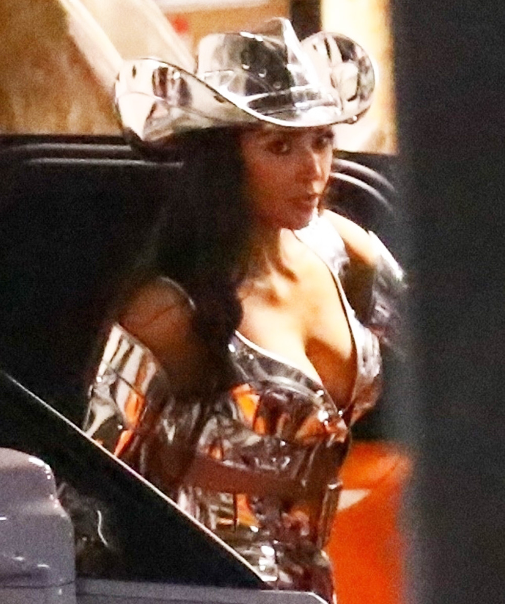 *EXCLUSIVE* Kim Kardashian sports a sexy space cowboy costume while leaving a Halloween party at TAO -