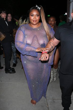 Lizzo leaves little to the imagination in a 'barely there' outfit while leaving Cardi B's Birthday party in Los Angeles, CA. 12 Oct 2021 Pictured: Lizzo. Photo credit: MEGA TheMegaAgency.com +1 888 505 6342 (Mega Agency TagID: MEGA795696_005.jpg) [Photo via Mega Agency]