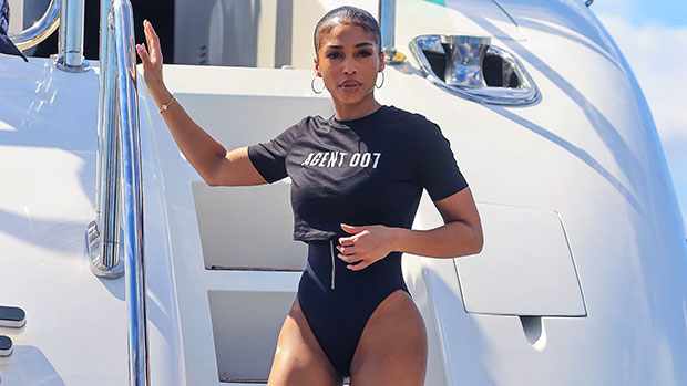 Lori Harvey Rocks Black Swimsuit On A Yacht For Photo Shoot With Olivia Culpo & More