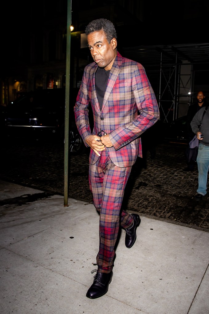 Chris Rock in a plaid suit