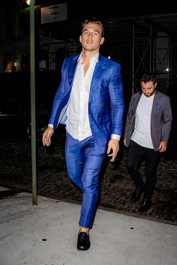 Tyler Cameron in a blue suit