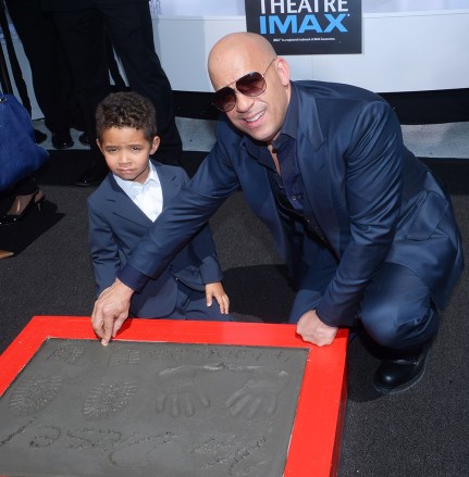Actor Vin Diesel and his son Vincent Sinclair participate in a hand & footprint ceremony immortalizing Diesel in the forecourt of TCL Chinese Theatre (formerly Grauman's) in the Hollywood section of Los Angeles on April 1, 2015.
Vin Diesel Handprint Ceremony, Los Angeles, California, United States - 01 Apr 2015