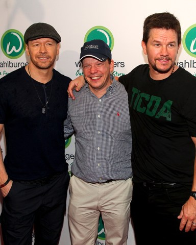 Donnie Wahlberg, from left, Paul Wahlberg and Mark Wahlberg attend the Wahlburgers Coney Island preview party, in New YorkWahlburgers Coney Island Preview Party, New York, USA - 23 Jun 2015