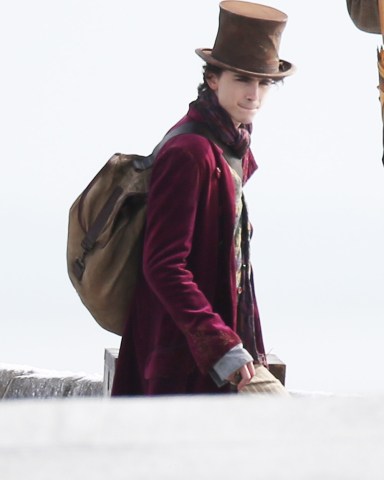Timothee Chalamet, Matt Lucas, and Tom Davis filming Paul King directed "Wonka"The story will focus specifically on a young Willy Wonka (Timoth√©e Chalamet) and how he met the Oompa-Loompas on one of his earliest adventures.Pictured: Timothee ChalametRef: SPL5265196 111021 NON-EXCLUSIVEPicture by: Click News & Media / Dean / SplashNews.comSplash News and PicturesUSA: +1 310-525-5808London: +44 (0)20 8126 1009Berlin: +49 175 3764 166photodesk@splashnews.comWorld Rights