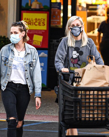 Kristen Stewart and girlfriend Dylan Meyer were spotted stocking up on groceries at the Ralphs Supermarket in Malibu, CA. The two were seen pushing a cart full of goods after shopping for about an hour. 27 Aug 2020 Pictured: Kristen Stewart and girlfriend Dylan Meyer were spotted stocking up on groceries at the Ralphs Supermarket in Malibu, CA. The two were seen pushing a cart full of goods after shopping for about an hour. Photo credit: Marksman / MEGA TheMegaAgency.com +1 888 505 6342 (Mega Agency TagID: MEGA696905_001.jpg) [Photo via Mega Agency]