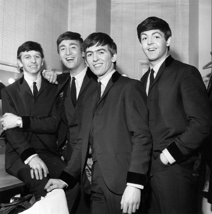 The Beatles smile for a pic