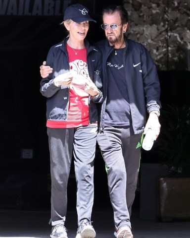 Los Angeles, CA  - *EXCLUSIVE*  - PICS TAKEN: 06/14/2022Beatles drummer Ringo Starr is seen with his wife Barbara Bach wearing matching black colored tracksuits as they shop for Plants at a nursery in Van Nuys. Ringo and Barbara have been married for over 40 years and Ringo who was about to start a North American tour has had to cancel on news that one of his bandmates has contracted Covid.Pictured: Ringo Starr, Barbara BachBACKGRID USA 11 JULY 2022 USA: +1 310 798 9111 / usasales@backgrid.comUK: +44 208 344 2007 / uksales@backgrid.com*UK Clients - Pictures Containing ChildrenPlease Pixelate Face Prior To Publication*