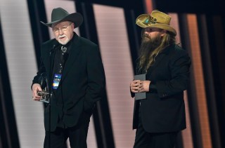 Mike Henderson, left, and Chris Stapleton accept the song of the year award for "Starting Over" at the 55th annual CMA Awards, at the Bridgestone Arena in Nashville, Tenn
55th Annual Country Music Awards - Show, Nashville, United States - 10 Nov 2021