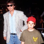 GEORGE HARRISON WITH HIS SON DHANI AT LONDON HEATHROW AIRPORT, BRITAIN - 1990