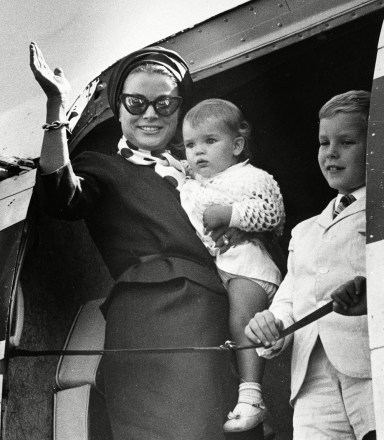 Princess Grace Princess Grace of Monaco, the former Grace Kelly of Philadelphia, Pa., waves from the doorway of the plane as she arrives in Boston, Ma., with her daughter, Stephanie, and son, Albert, on . They are en route to her home townPRINCESS GRACE CHILDREN, BOSTON, USA