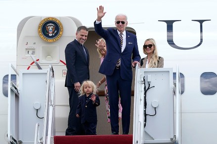 President Joe Biden, center, waves as he is joined by, from left, son Hunter Biden, grandson Beau Biden, first lady Jill Biden and daughter-in-law Melissa Cohen, as they stand at the top of the steps of Air Force One at Andrews Air Force Base, Md ., .  They go to South Carolina for a week-long vacation at Kiawah Island Biden, Andrews Air Force Base, United States - Aug 10, 2022
