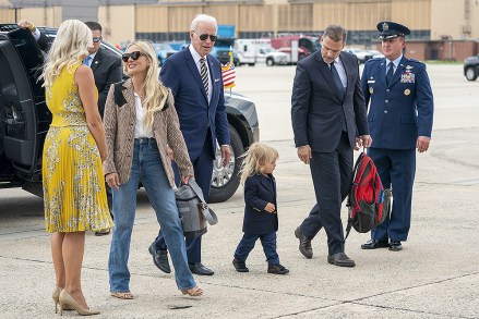 US President Joe Biden walks with his grandson Beau Biden Jr. (2-R), son Hunter Biden (R), and Melissa Cohen (2-L) aboard Air Force One at Joint Base Andrews, Maryland, Wednesday, August 10 , 2022. President Biden leaves Washington for Vacation, District of Columbia, United States - 10 Aug 2022