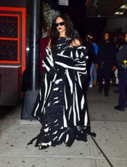 New York, NY  - *EXCLUSIVE*  - Singer Rihanna channels her inner Beetle Juice as she steps out for her brother Rory's Halloween party in NYC at 5am. The singer stepped out in a black and white dress and matching coat for the event.

Pictured: Rihanna

BACKGRID USA 1 NOVEMBER 2021 

BYLINE MUST READ: PapCulture / BACKGRID

USA: +1 310 798 9111 / usasales@backgrid.com

UK: +44 208 344 2007 / uksales@backgrid.com

*UK Clients - Pictures Containing Children
Please Pixelate Face Prior To Publication*