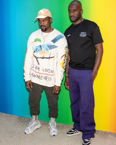 Virgil Abloh and Kanye West share an emotional hug at Paris