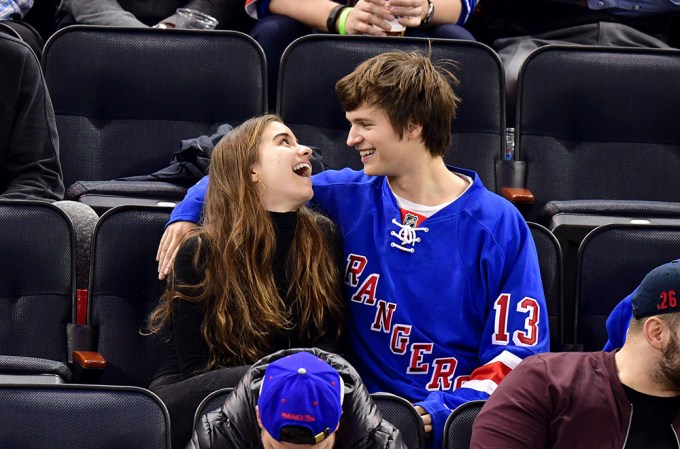 Ansel and Violetta cuddle up at a NHL game