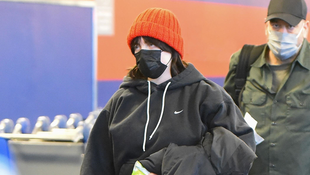 BTS arrive at JFK Airport in NY wearing face masks ahead of New