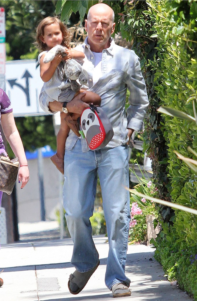 Bruce Willis Carries Daughter Mabel In LA In 2014