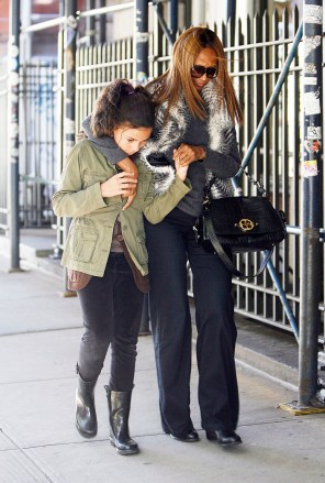 November 4 2011, New York City....Model Iman and her daughter Alexandria Zahra Jones walking in Soho on November 4 2011 in New York City.... Newscom/(Mega Agency TagID: acephotos235689.jpg) [Photo via Mega Agency]