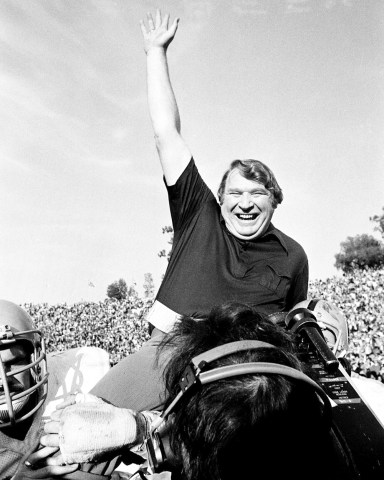 Coach John Madden of the Oakland Raiders is carried from the field by his players after his team defeated the Minnesota Vikings in Super Bowl XI in Pasadena, Calif., Jan. 9, 1977 John Madden, the Hall of Fame coach turned broadcaster whose exuberant calls combined with simple explanations provided a weekly soundtrack to NFL games for three decades, died, the NFL said. He was 85
Obit Madden Football, Pasadena, United States - 09 Jan 1977