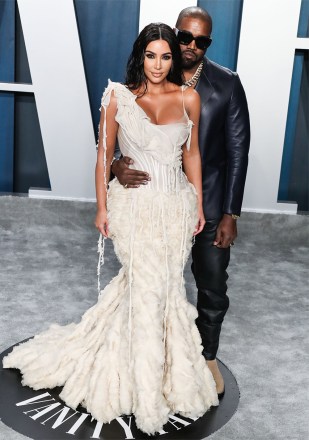 Television personality Kim Kardashian West wearing an Alexander McQueen dress and Lorraine Schwartz jewelry and husband/rapper Kanye West wearing a Dunhill look arrive at the 2020 Vanity Fair Oscar Party held at the Wallis Annenberg Center for the Performing Arts on February 9, 2020 in Beverly Hills, Los Angeles, California, United States.
2020 Vanity Fair Oscar Party, Beverly Hills, United States - 10 Feb 2020