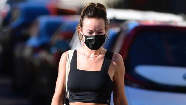 Olivia Wilde shows off her incredible physique in a purple sports bra and  leggings as she