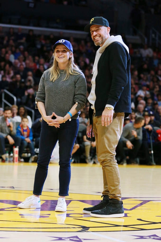 Reese Witherspoon & Jim Toth at a Harlem Globetrotters game