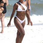 EXCLUSIVE: Actress Gabrielle Union looks amazing in a white bikini as she hits the beach in Miami