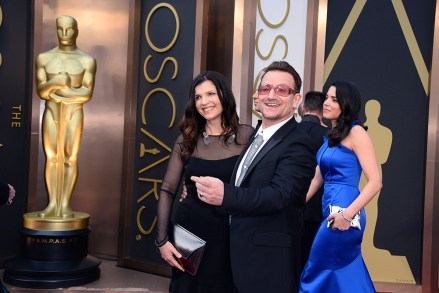 Bono, right, and Ali Hewson arrive at the Oscars, at the Dolby Theater in Los Angeles 86th Academy Awards - Arrivals, Los Angeles, USA - 2 Mar 2014