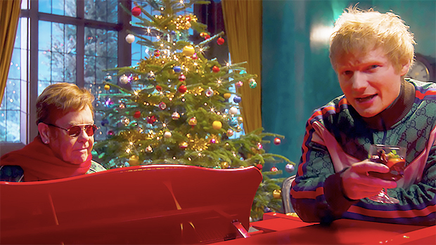 Ed Sheeran & Elton John Rock Matching Holiday Sweatsuits In Cheerful ‘Merry Christmas’ Video — Watch