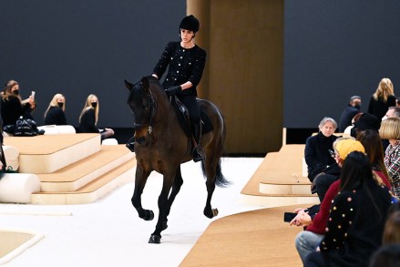 Charlotte Casiraghi riding a horse on the catwalk
Chanel show, Runway, Spring Summer 2022, Haute Couture Fashion Week, Paris, France  - 25 Jan 2022