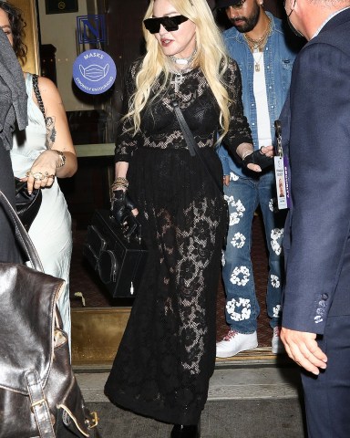 New York, NY  - *EXCLUSIVE*  - A fashionable Madonna stuns in a black lace dress as she leaves MJ The Musical on Broadway in New York.  Pictured: Madonna  BACKGRID USA 30 JULY 2022   USA: +1 310 798 9111 / usasales@backgrid.com  UK: +44 208 344 2007 / uksales@backgrid.com  *UK Clients - Pictures Containing Children Please Pixelate Face Prior To Publication*