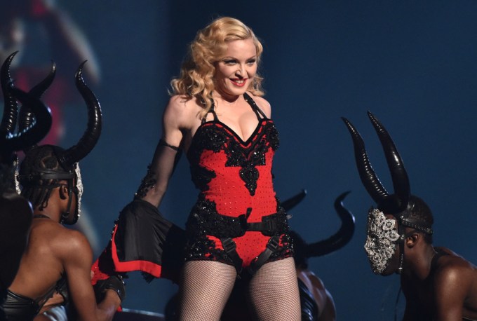 Madonna in a red and black sexy outfit