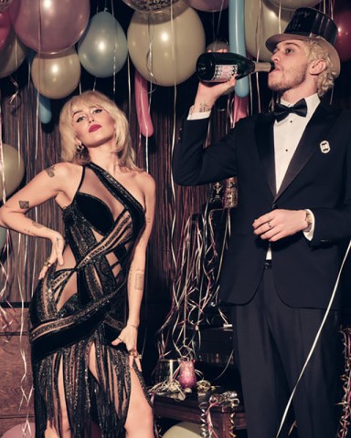 MILEY’S NEW YEAR’S EVE PARTY HOSTED BY MILEY CYRUS AND PETE DAVIDSON -- Pictured: (l-r) Miley Cyrus and Pete Davidson -- (Photo by: Vijat Mohindra/NBC)