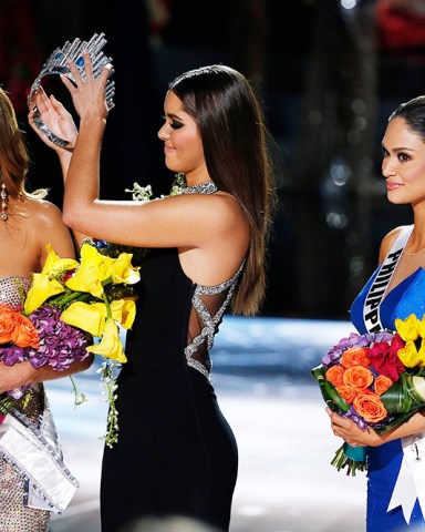 Former Miss Universe Paulina Vega, center, removes the crown from Miss Colombia Ariadna Gutierrez, left, before giving it to Miss Philippines Pia Alonzo Wurtzbach, right, at the Miss Universe pageant, in Las Vegas. Gutierrez was incorrectly named the winner before Wurtzbach was given the Miss Universe crown
Miss Universe Pageant, Las Vegas, USA - 20 Dec 2015