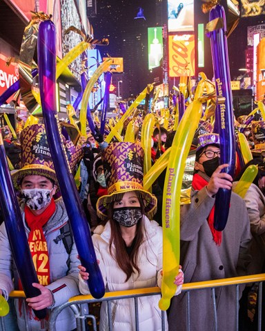 Revellers gather during the New Year's Eve celebrations in Times Square, in New York
New Year , New York, United States - 31 Dec 2021
