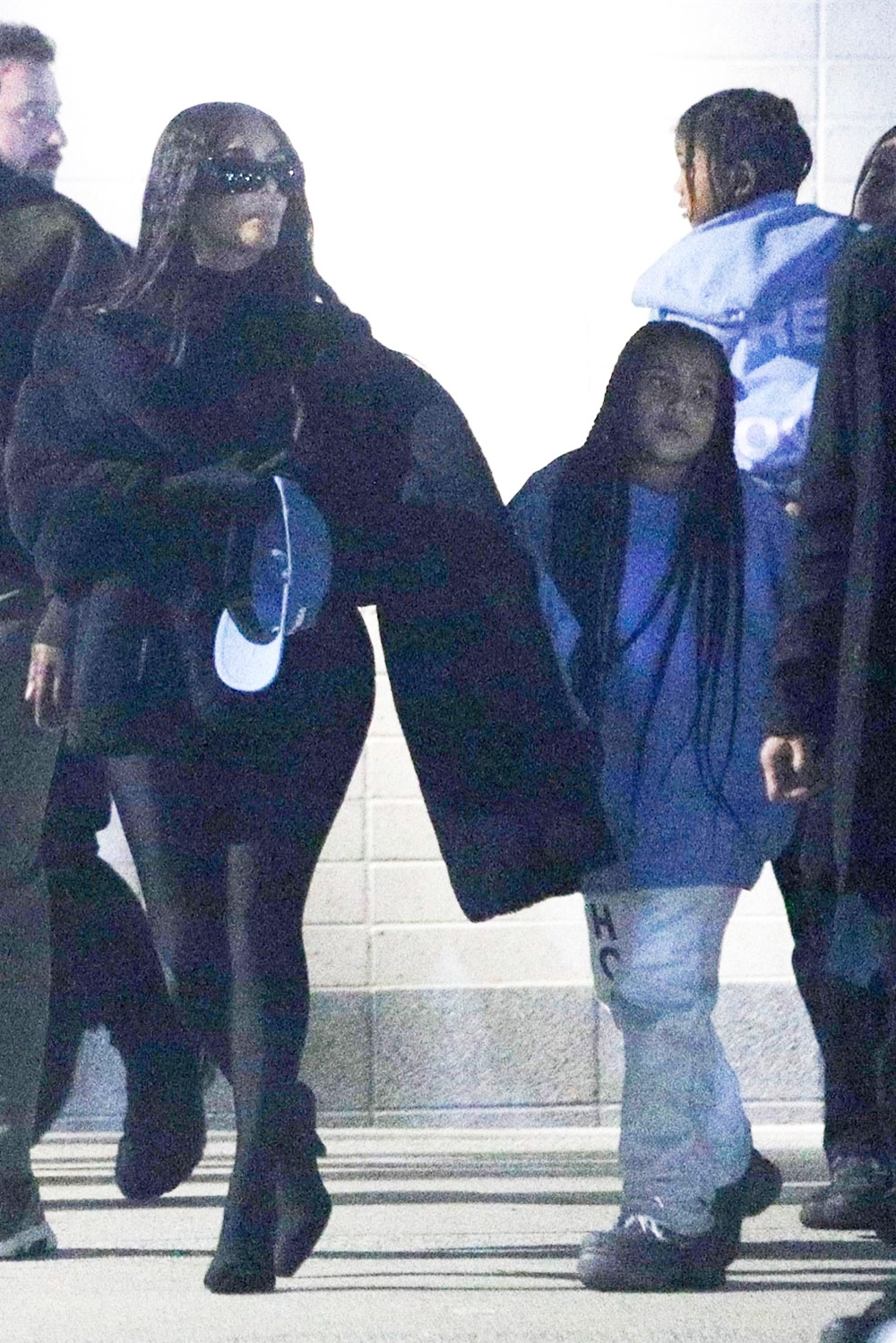 Kim Kardashian, North West, Saint West, and Corey Gamble leave the Free Larry Hoover Benefit Concert