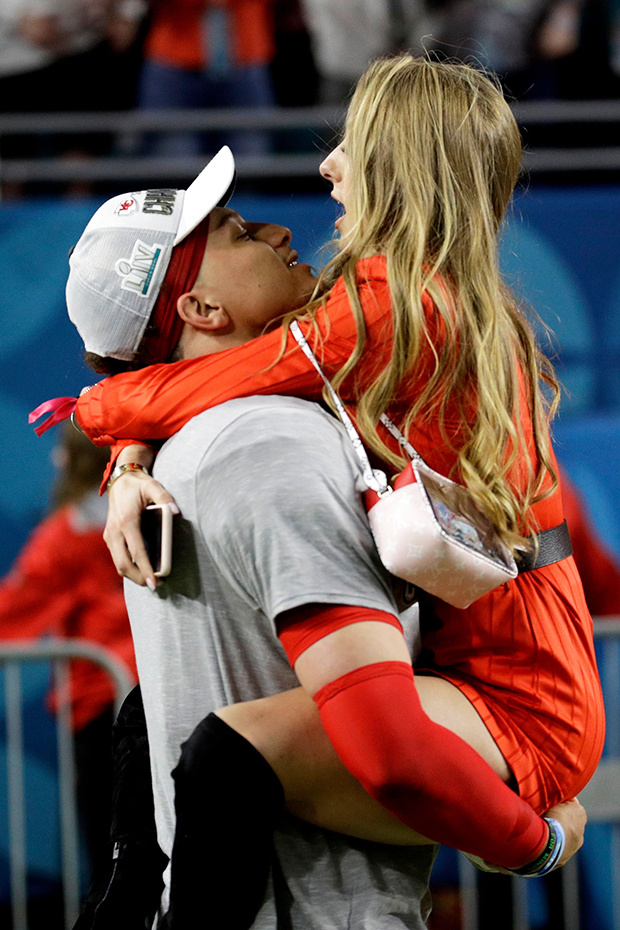 Patrick Mahomes kisses wife after Chiefs' Super Bowl 2023 win