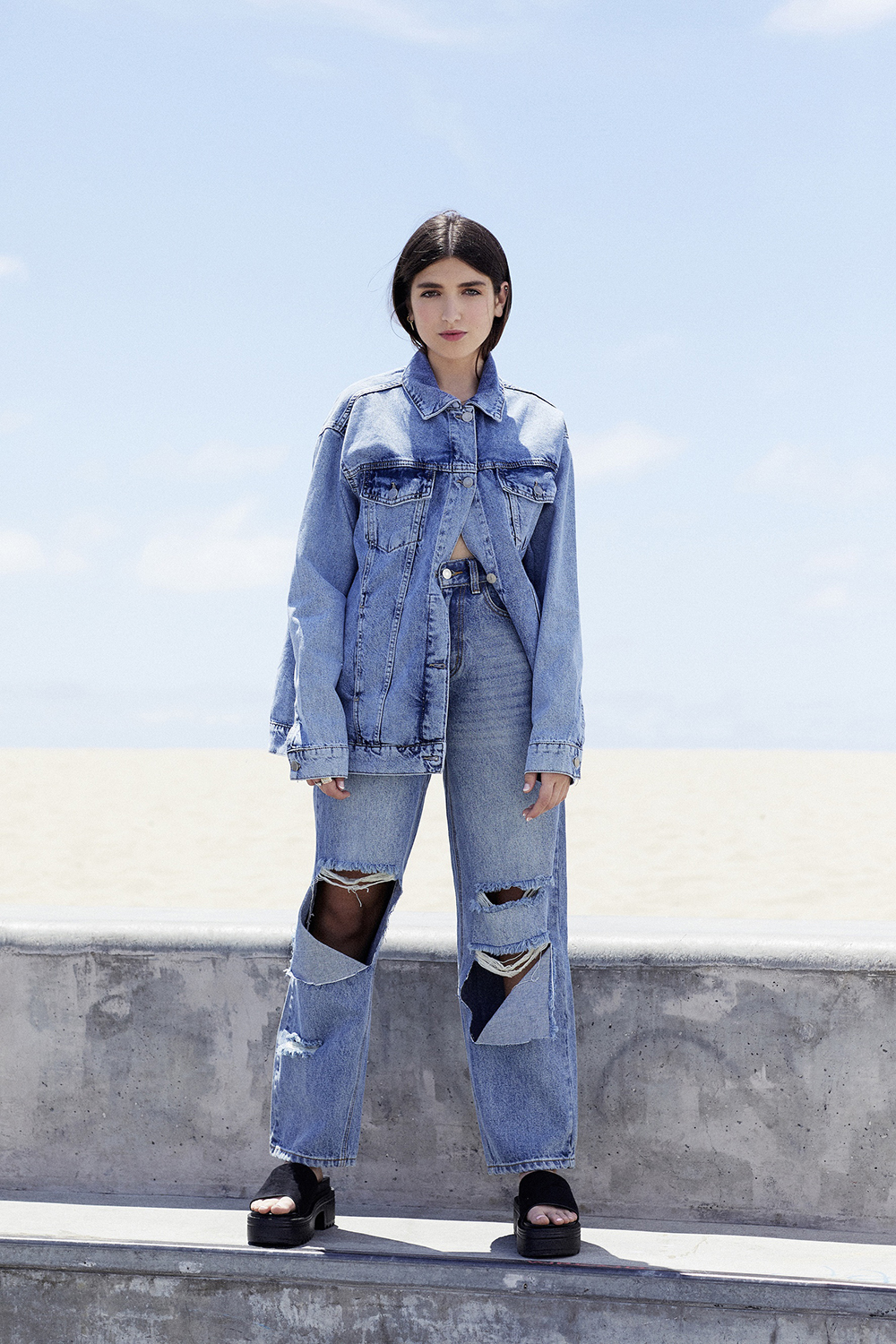 Dua Lipa’s little sis Rina makes an assault on LA in stunning Venice Beach photoshoot for Nasty Gal