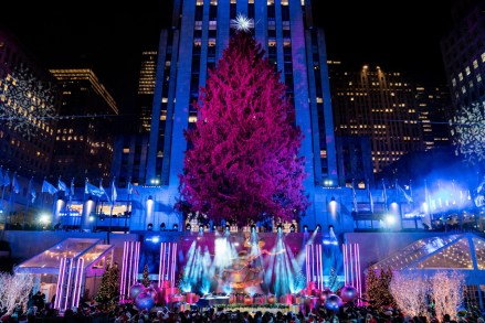 The Rockefeller Center Christmas tree is bathed in red lights before it is lit at Rockefeller Center during the 89th annual Rockefeller Center Christmas tree lighting ceremony, in New York
Rockefeller Center Christmas Tree, New York, United States - 01 Dec 2021