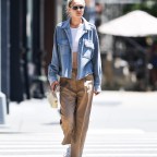 Gigi Hadid Seen Wearing A Crop Top And Denim Shirt In New York City