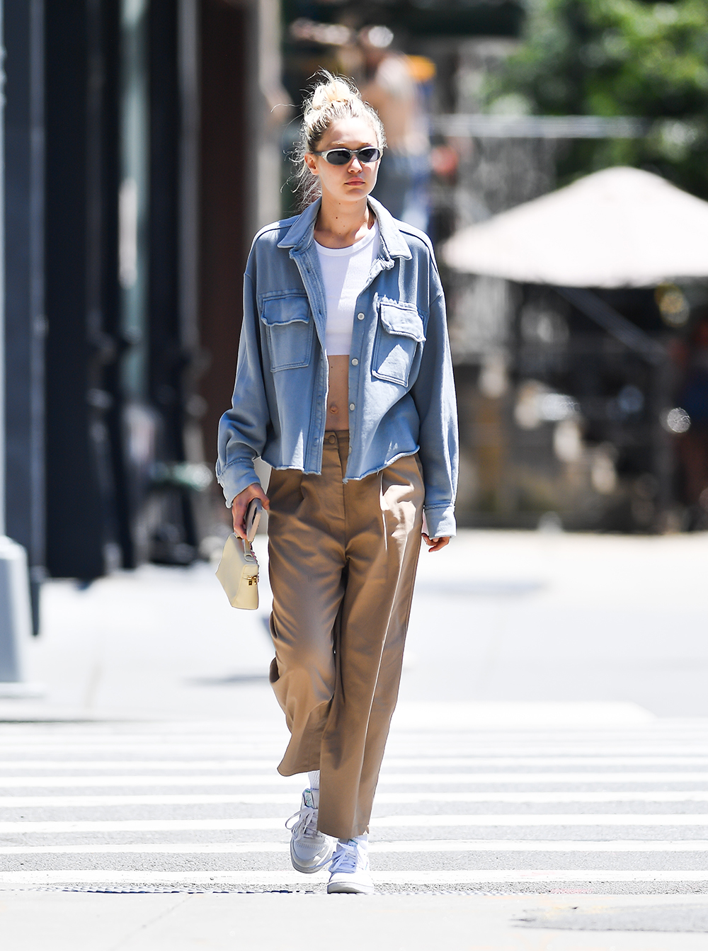 Gigi Hadid Seen Wearing A Crop Top And Denim Shirt In New York City