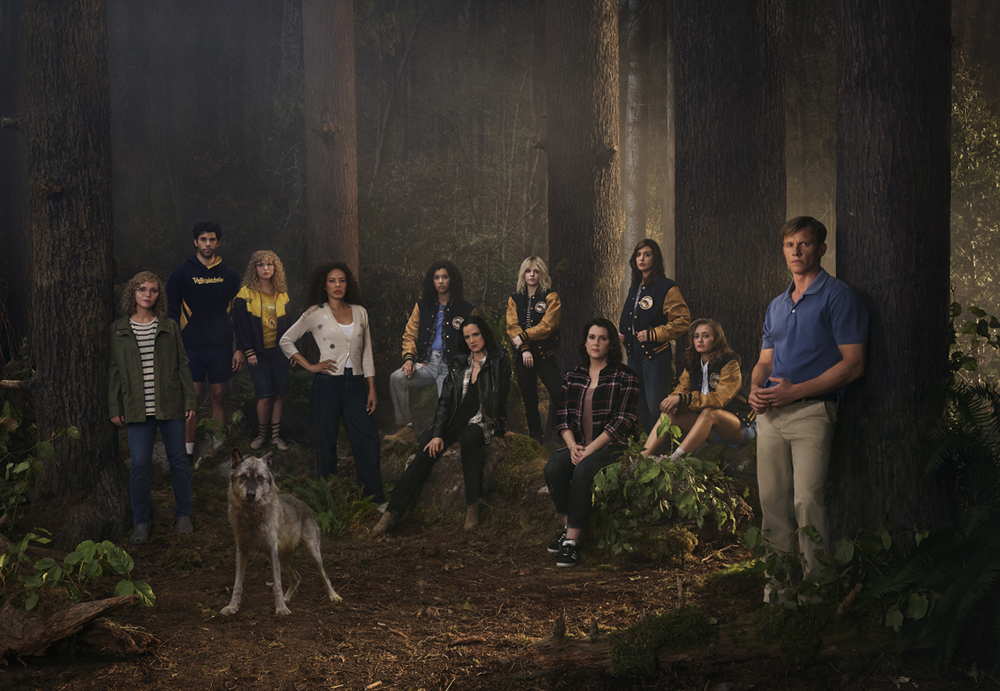 (L-R): Christina Ricci as Misty, Steven Krueger as Ben Scott, Samantha Hanratty as Teen Misty, Tawny Cypress as Taissa, Jasmin Savoy Brown as Teen Taissa, Juliette Lewis as Natalie, Sophie Thatcher as Teen Natalie, Melanie Lynskey as Shauna, Sophie Nélisse as Shauna, Ella Purnell as Teen Jackie and Warren Kole as Jeff Sadecki in YELLOWJACKETS.  Photo credit: Brendan Meadows/SHOWTIME.